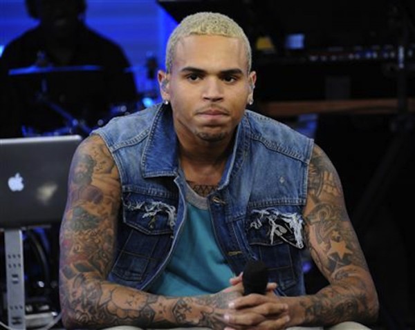 Chris Brown with exposed tattoos.