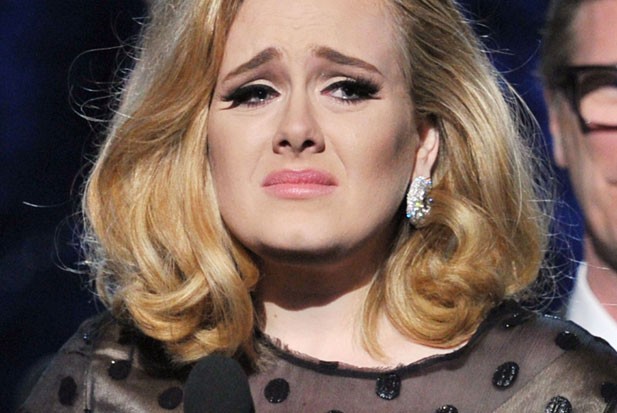 Adele looking sad.