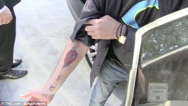 Charlie sheen baseball tattoo