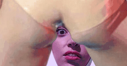 Lady Gaga looking through miley cyrus' thighs
